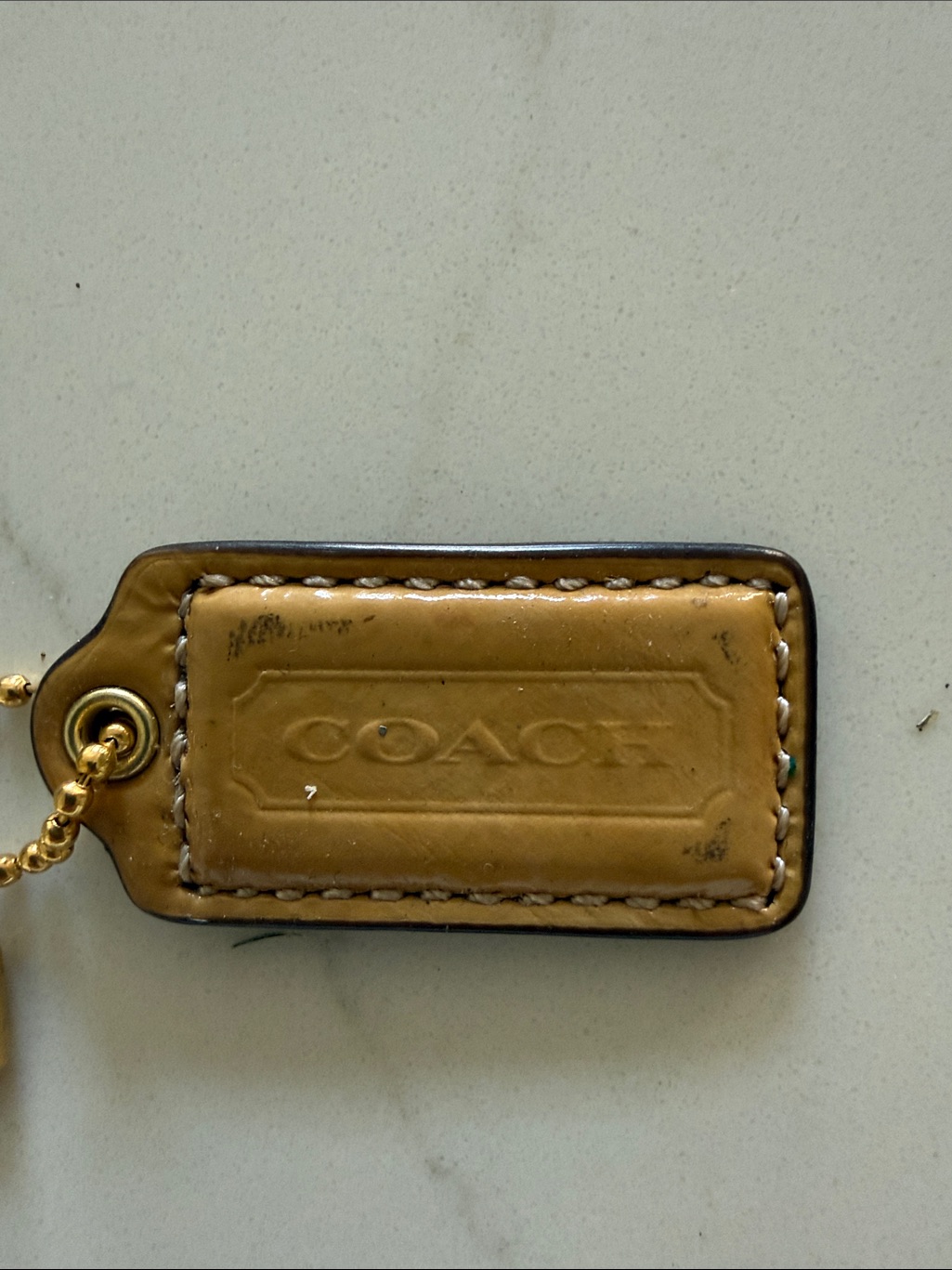 Coach Hang Tag